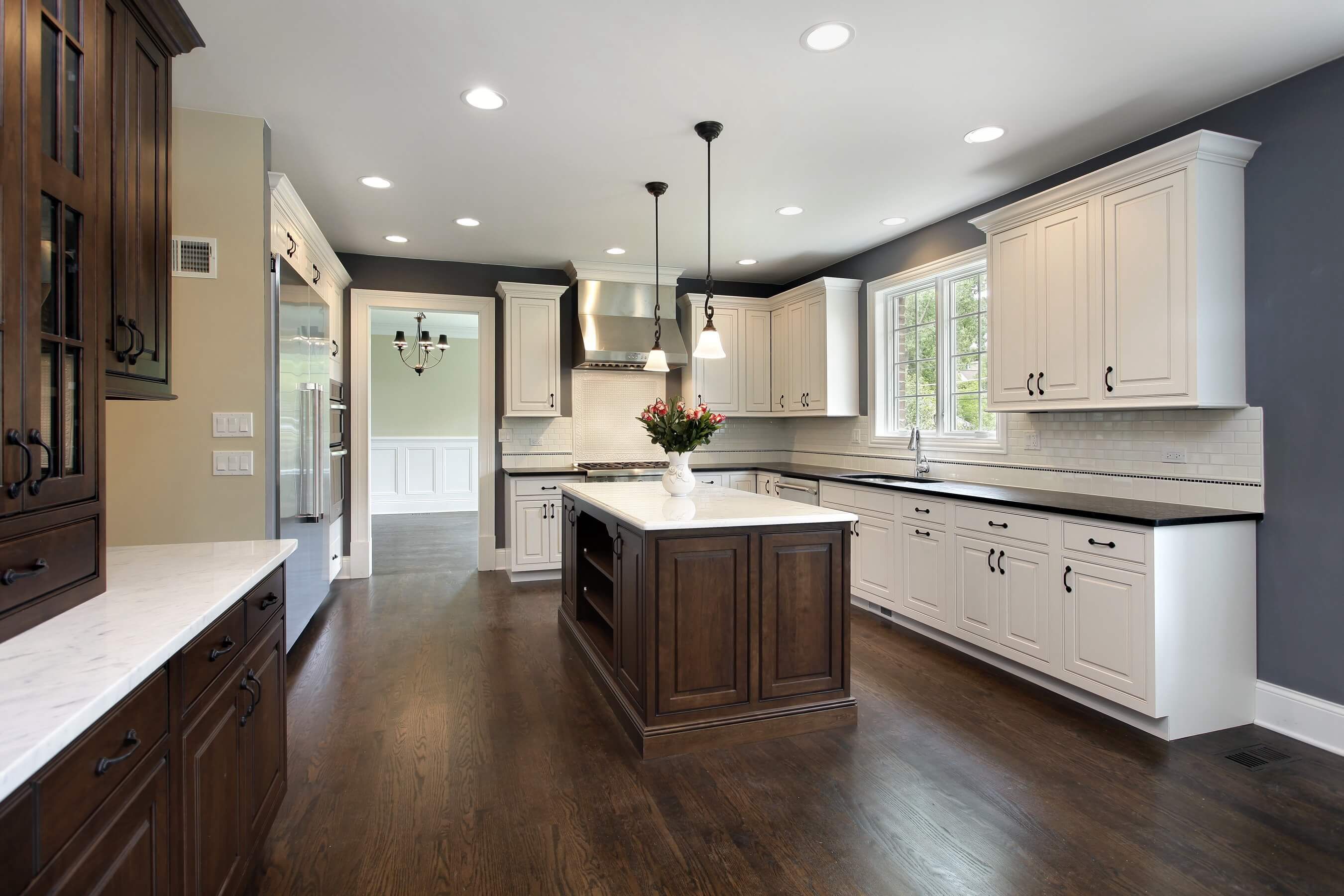 Shaker kitchen with dark hardwood floor